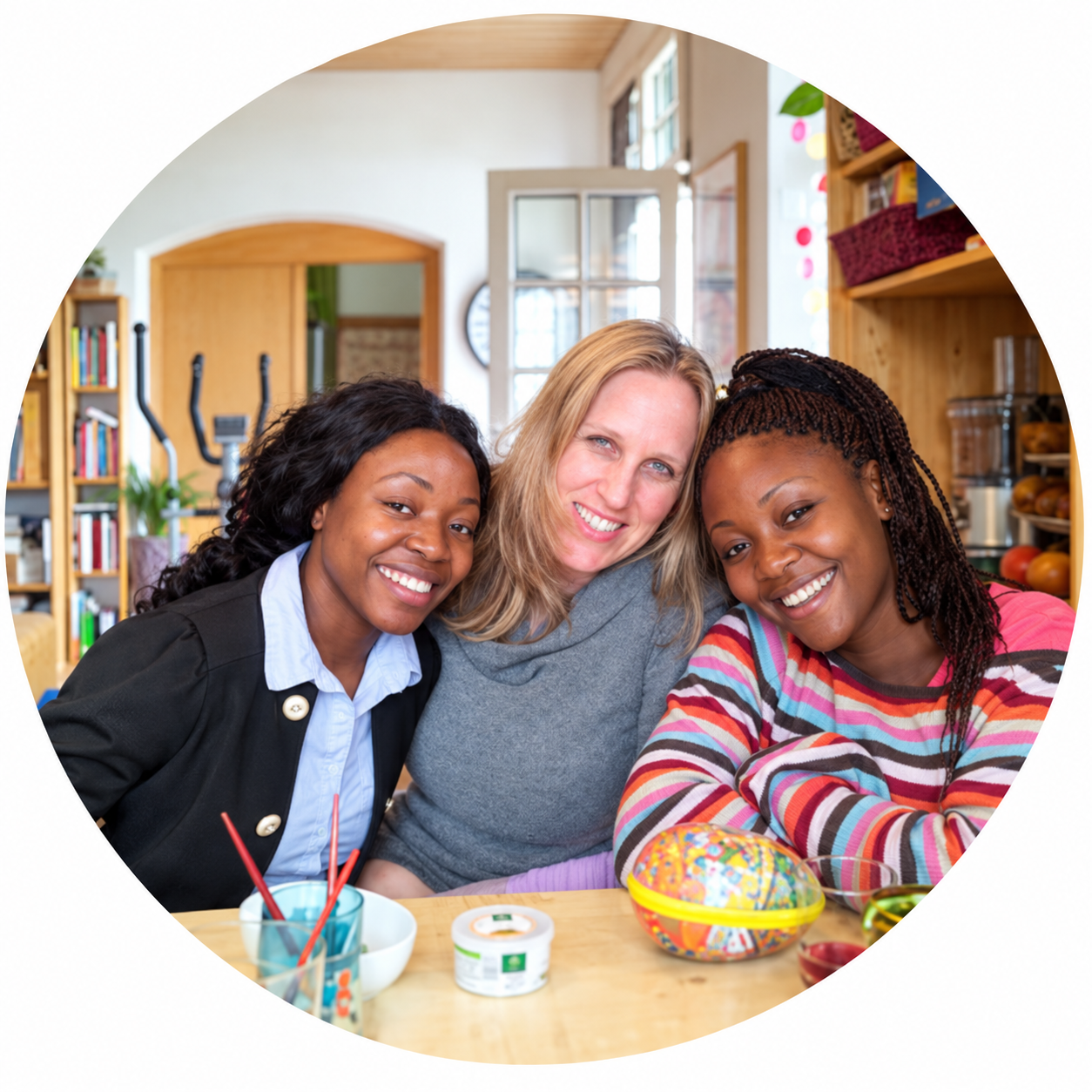 Stephanie mit zwei ihrer Au-pairs